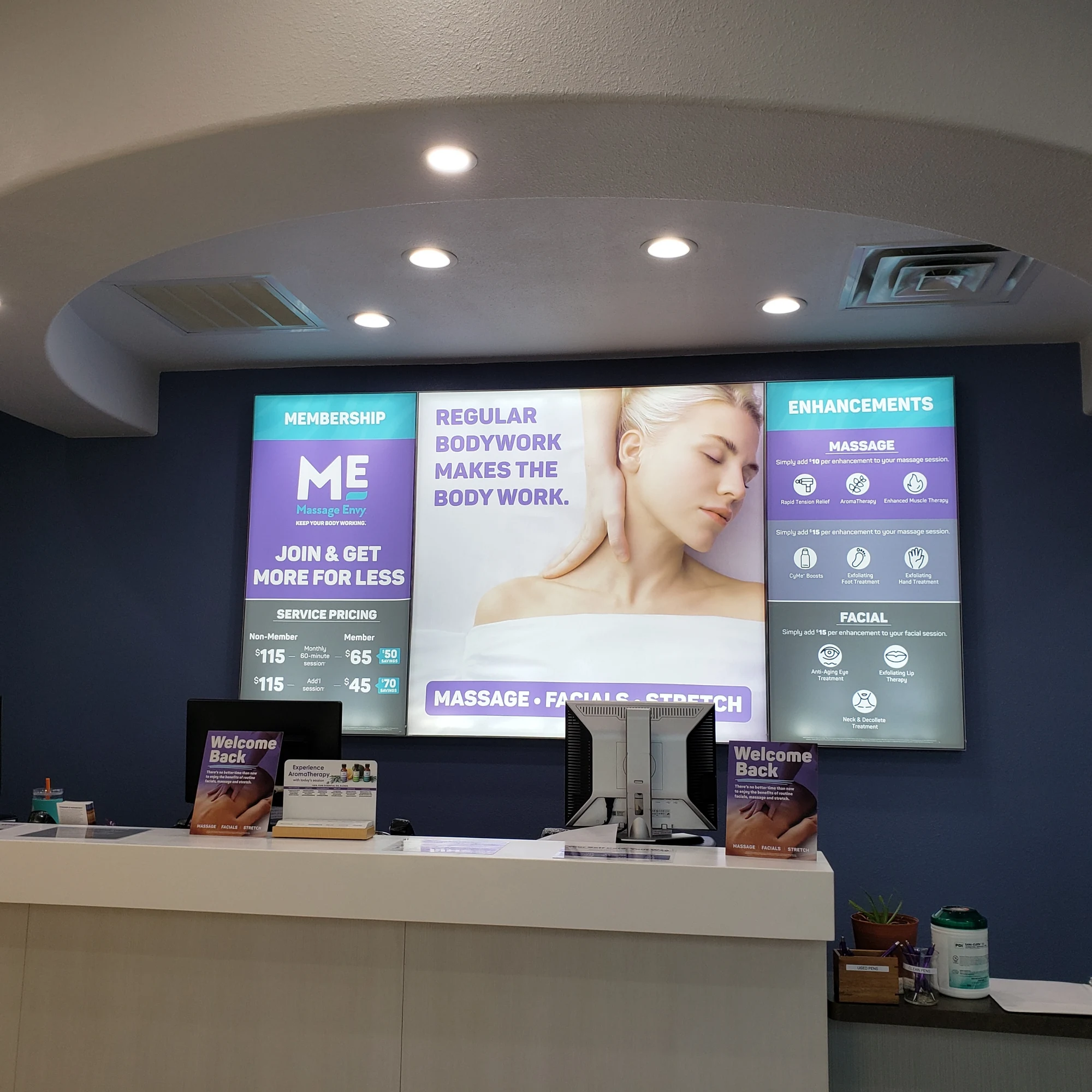 Massage Envy wellness build-out by ASEL10 Services — completed reception, treatment rooms and guest corridors