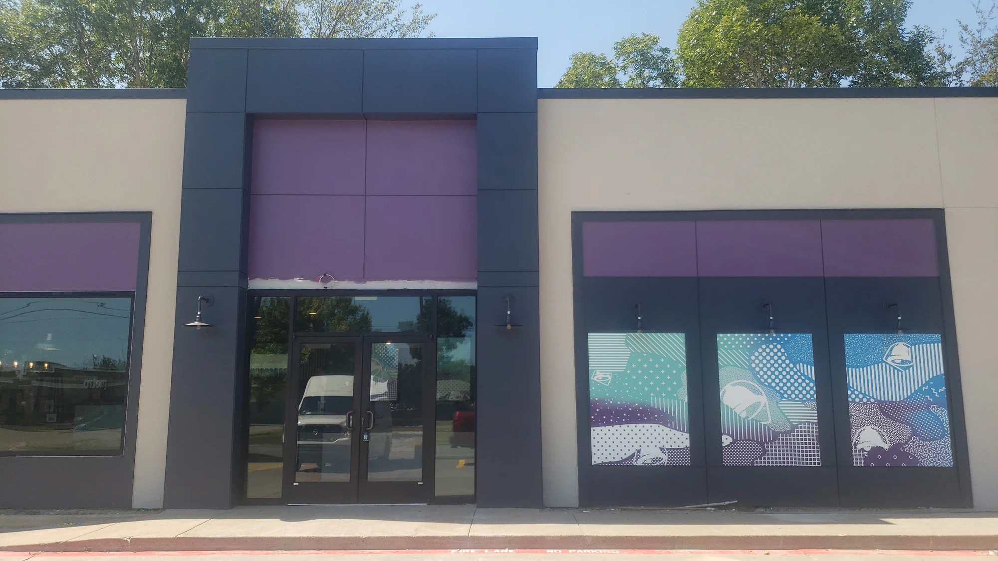 Taco Bell restaurant build-out by ASEL10 Services — completed exterior and storefront at handover